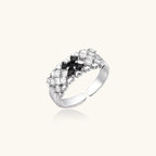White gold plated adjustable ring with three rows of square zirconia stones in black or pink chevron pattern