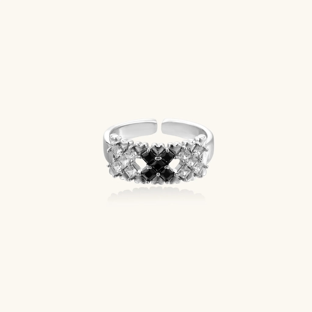 White gold plated adjustable ring with three rows of square zirconia stones in black or pink chevron pattern