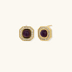 Gold-plated octagonal stud earrings with burgundy liuli centers and cubic zirconia halos on white background