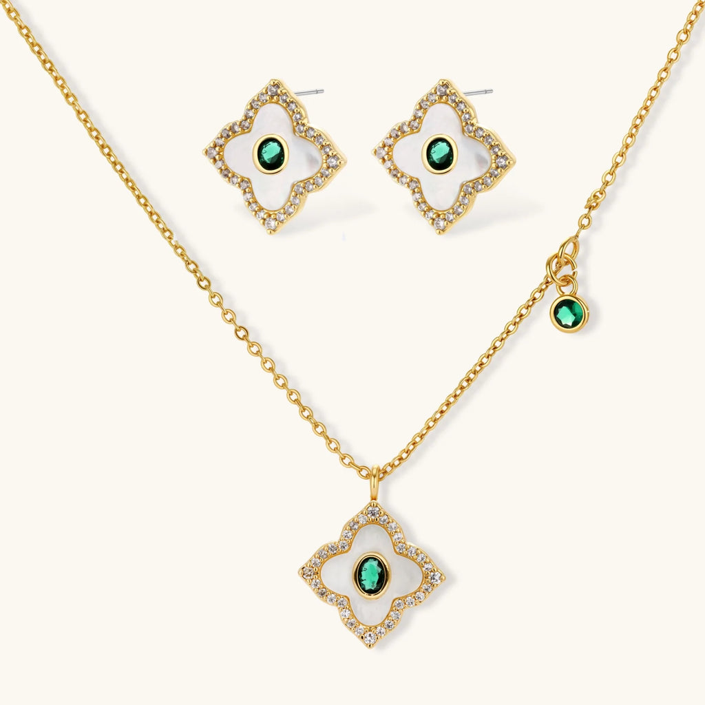 Gold-plated jewelry set with diamond-shaped pendants featuring white centers, green stones, and sparkling zirconia borders