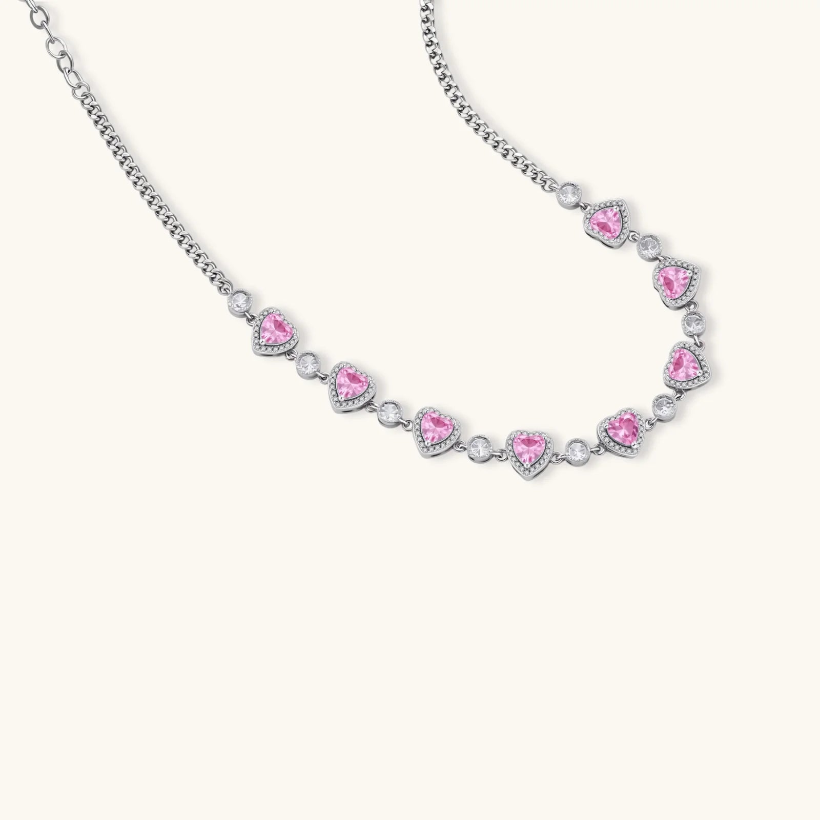 Pink heart-shaped cubic zirconia jewelry set with white gold plating featuring necklace, earrings, bracelet and ring