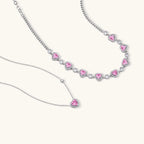 Pink heart-shaped cubic zirconia jewelry set with white gold plating featuring necklace, earrings, bracelet and ring