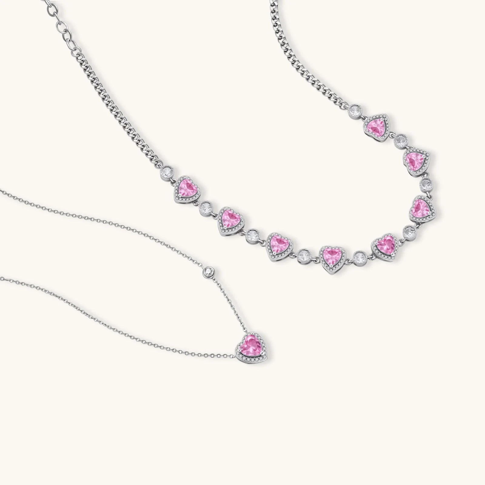Pink heart-shaped cubic zirconia jewelry set with white gold plating featuring necklace, earrings, bracelet and ring