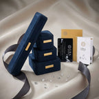 Sterling silver crossover ring with pavé-set moissanite stones creating an elegant infinity design on neutral background