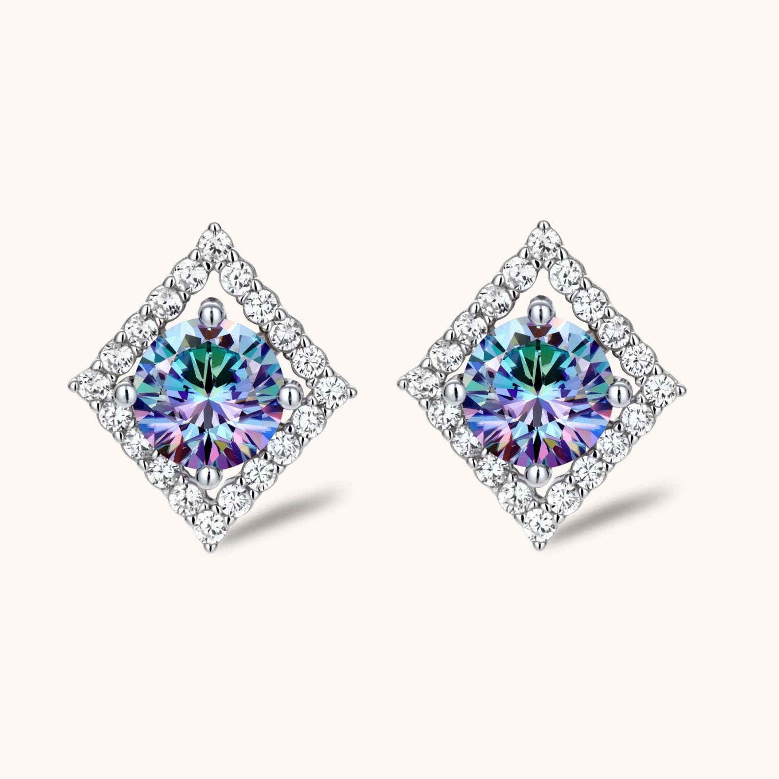 Diamond-shaped sterling silver stud earrings with rainbow moissanite centers surrounded by crystal halos